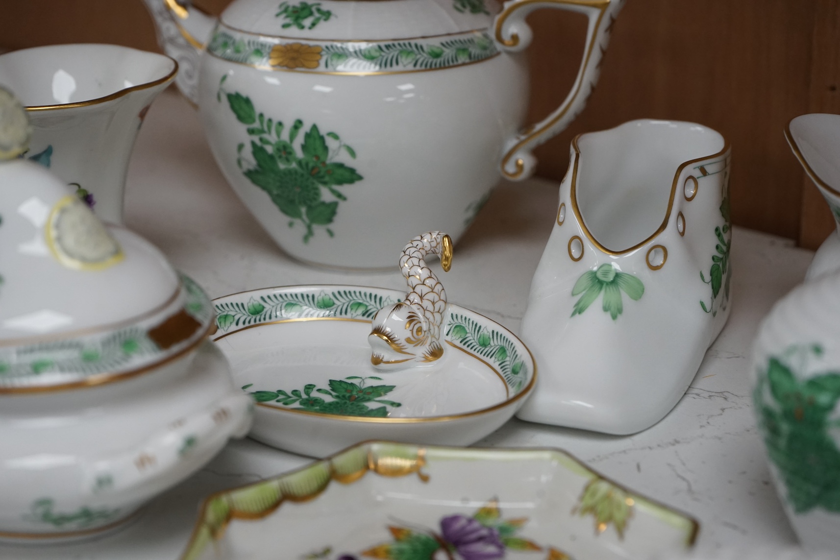 A collection of small items of Herend china: including eight items of a tea for two, a tureen and cover, a vase and various ticket dishes, baskets etc, coffee pot 13cm high. Condition - good